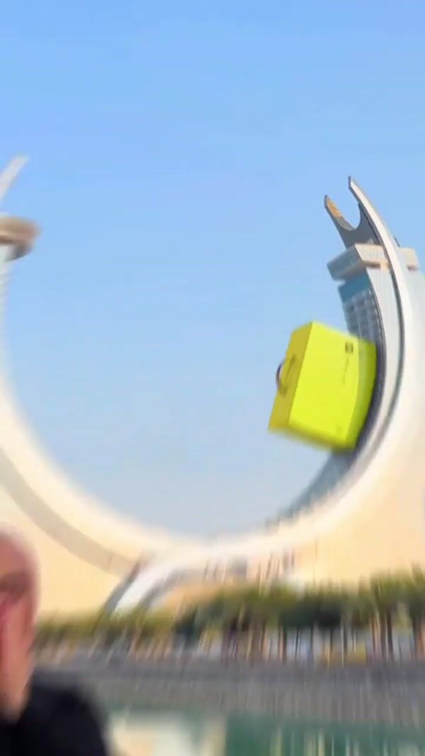 Gold Apple Giant Bag Glides at Katara Towers