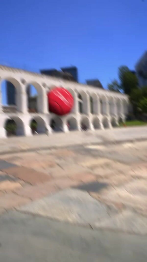 Claro Red Tennis Ball Trapped at Arcos da Lapa