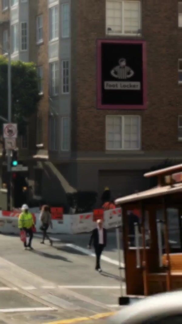 Foot Locker Sneaker Lands on Cable Car