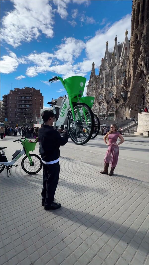 Lime E-bike Rolls in Front of Sagrada Familia