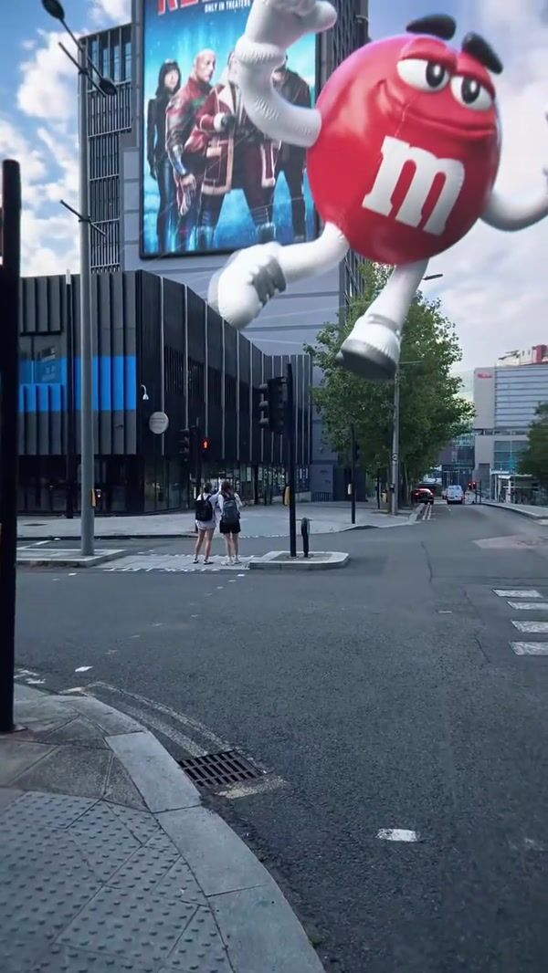 M&M's Red Character Balloon on Building