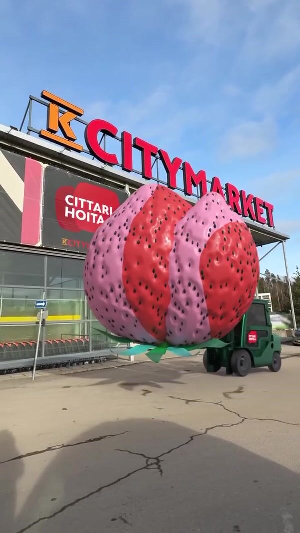 K-Citymarket Forklift Transports Giant Strawberry