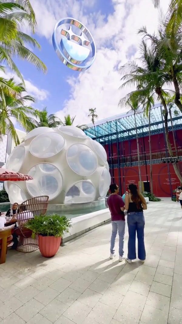 BIGFACEBRAND Logo Floats Above Miami Eye Dome