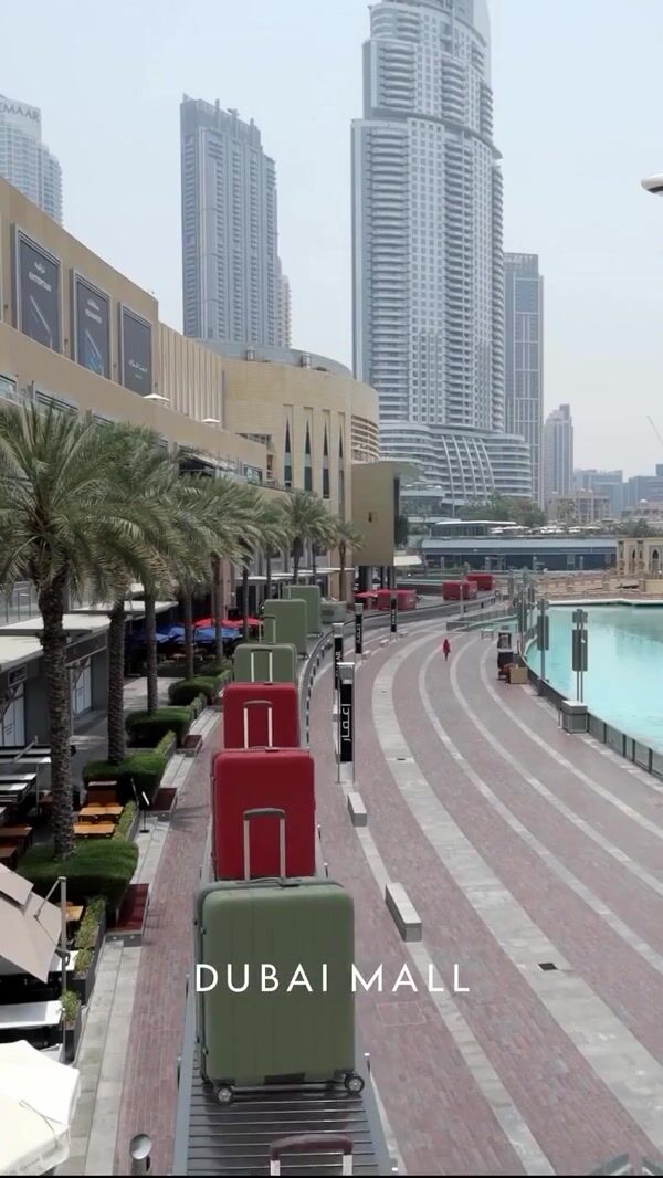 Dubai Mall Giant Suitcases Roll Through City