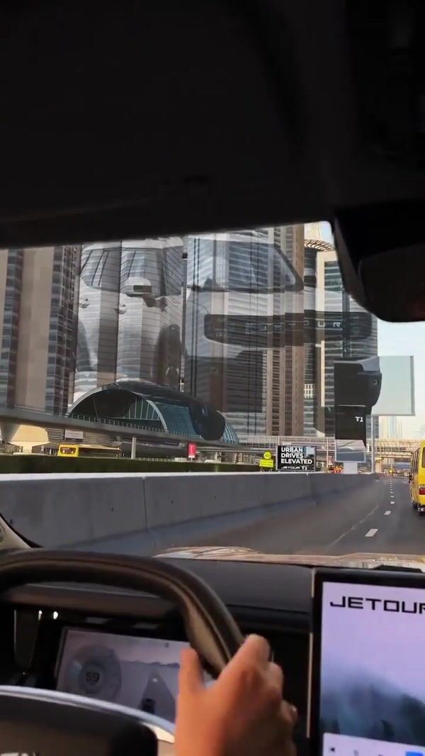Jetour SUV Projected on Skyscrapers