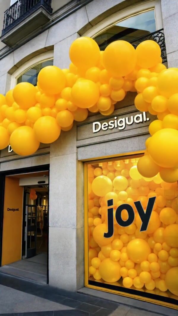 Desigual Yellow Balloons Overflow From Store