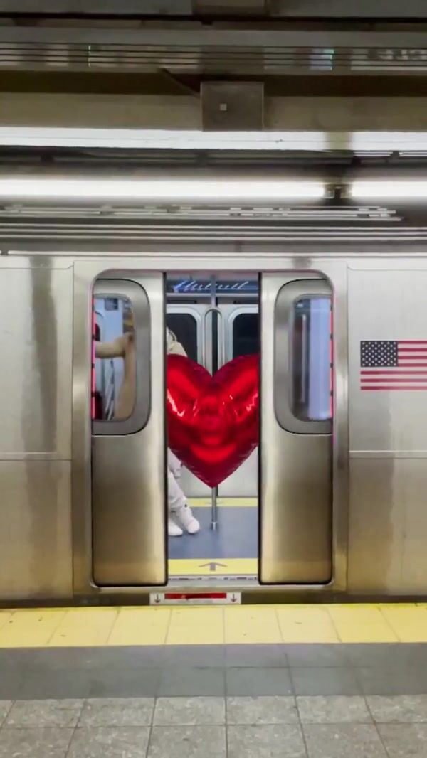 DKNY Heart Balloon Stuck in Train Door