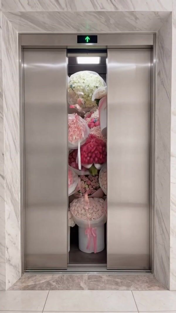 Anthurium Flowers Bouquets Spill from Elevator