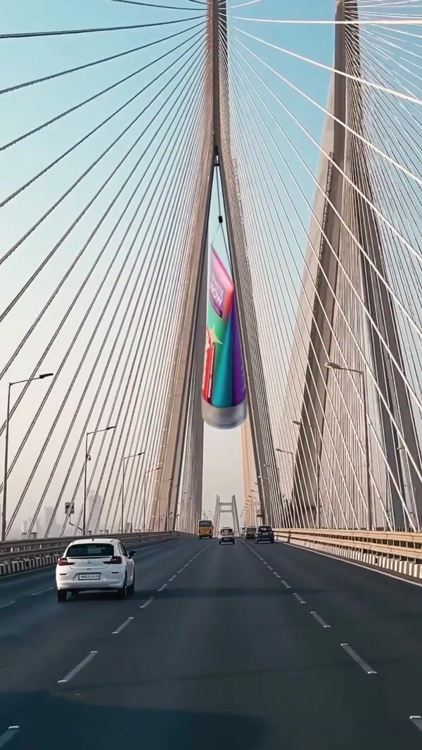 CloseUp Giant Toothpaste Sways Over Bridge