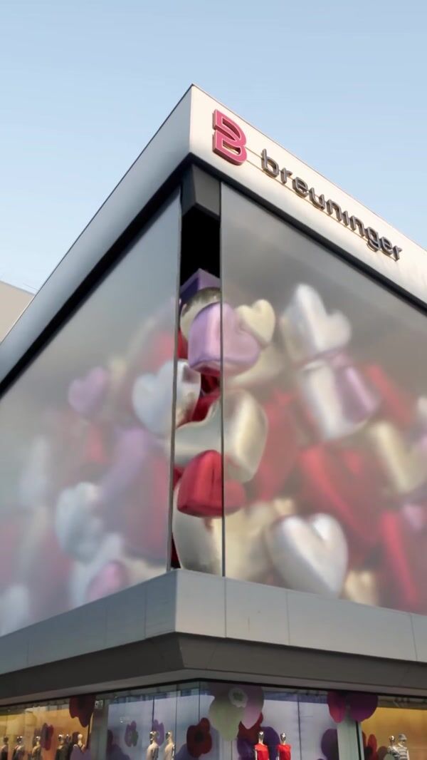 Breuninger Colorful Hearts Float From Store Facade