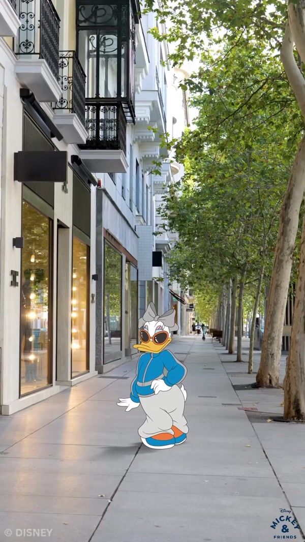 Disney Daisy Duck Poses at Urban Street