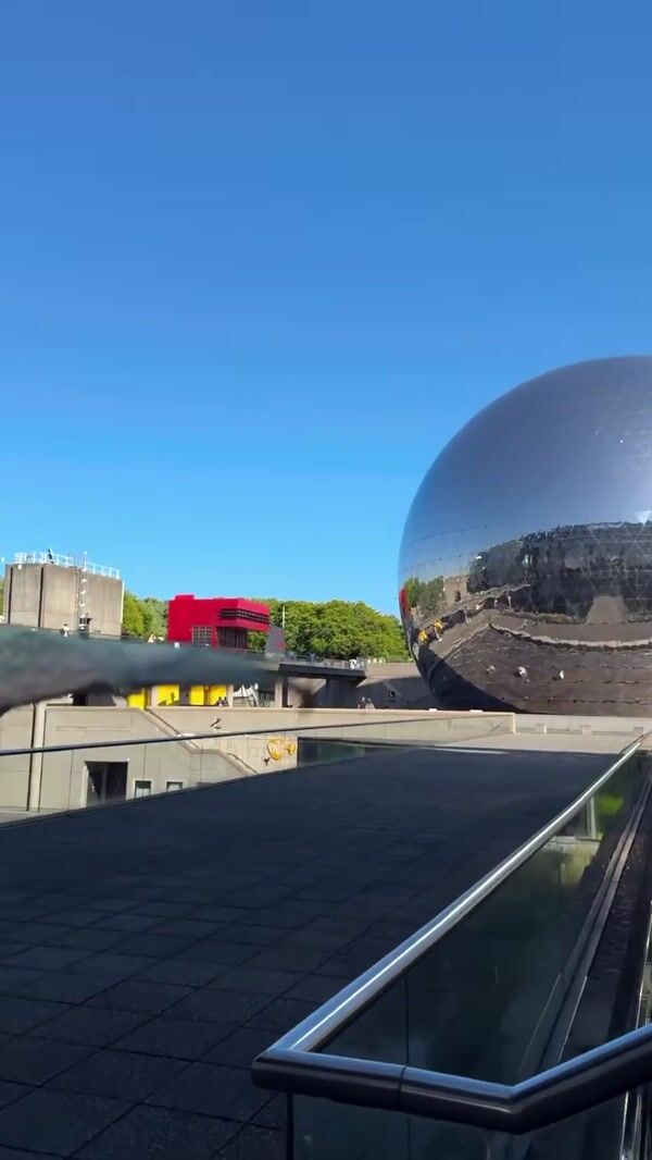 Pathé Dragons Playing Near Spherical Building