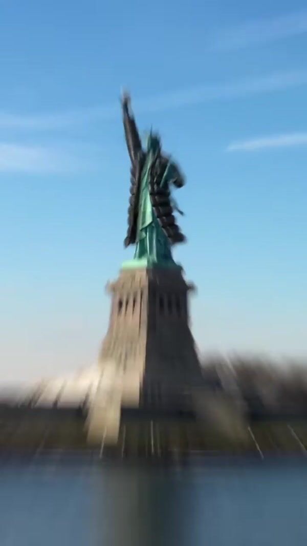 DKNY Statue of Liberty Wearing Trench Coat