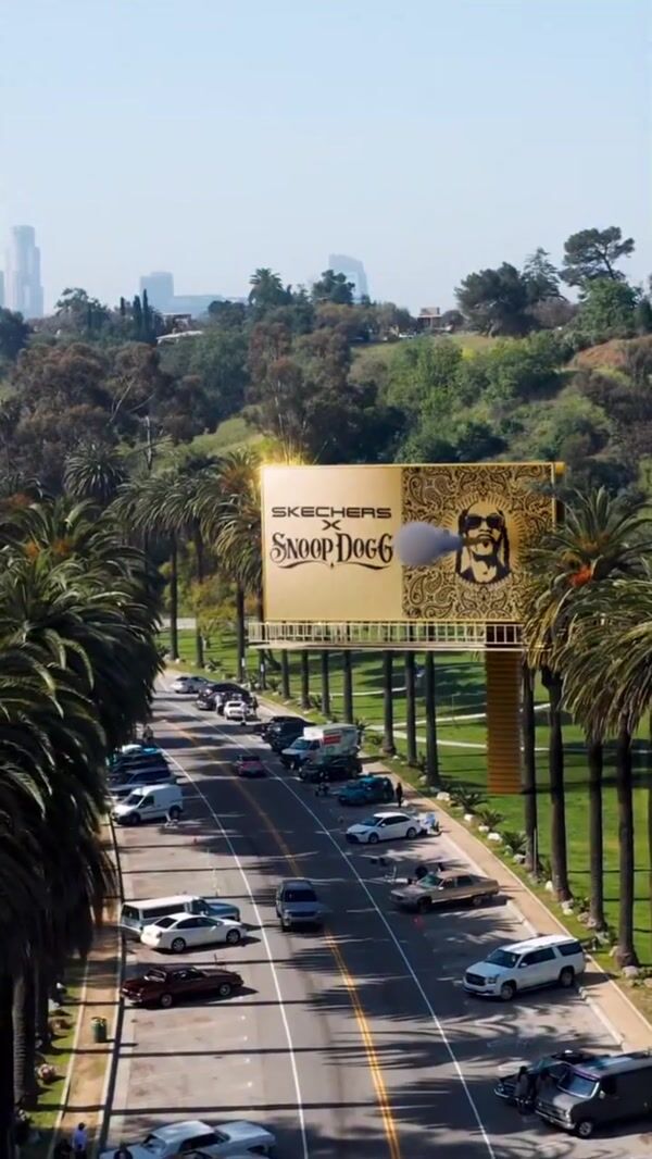 Snoop Dogg Billboard Blows Smoke With Sneaker