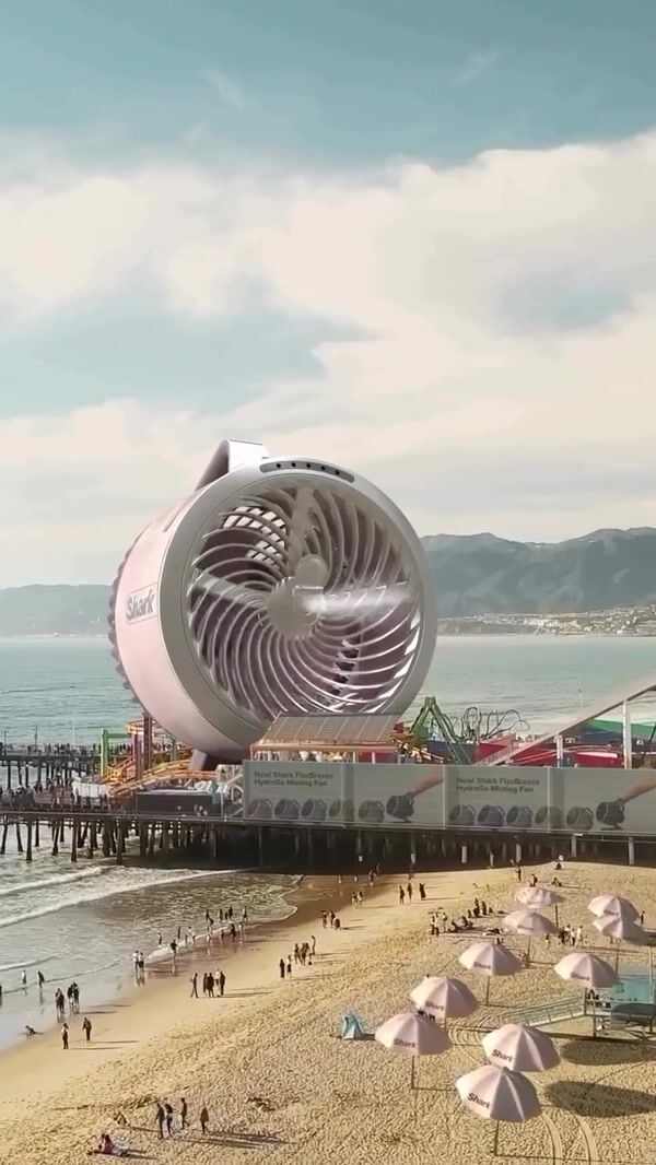 Shark Clean Giant Fan Blows Mist Across Beach