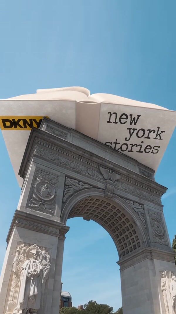 DKNY Book Flipping Above Arch Monument
