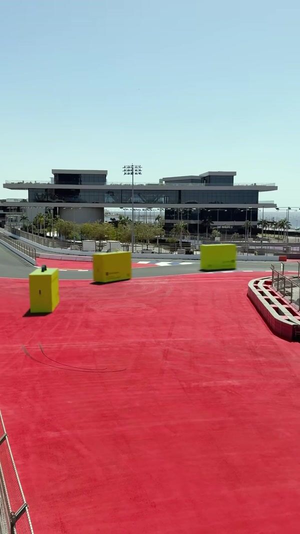 Gold Apple Delivery Boxes Racing on Track