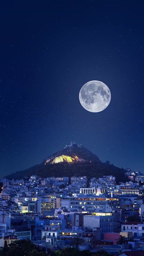 InterMed Man Covers Moon with Giant Black Sheet