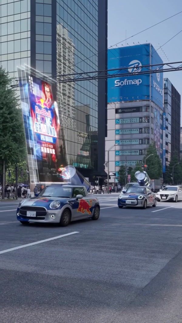 Red Bull Cars Displaying Hologram Poster in Tokyo