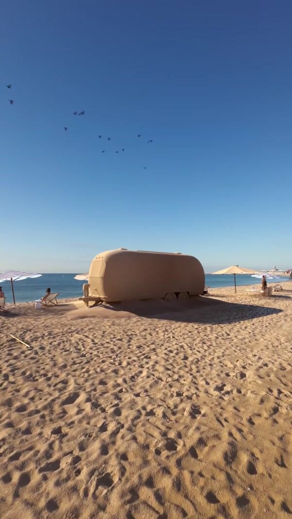 Maisons du Monde Sand-covered Trailer on Beach