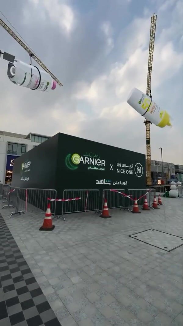 Garnier Skincare Products Suspended on Crane