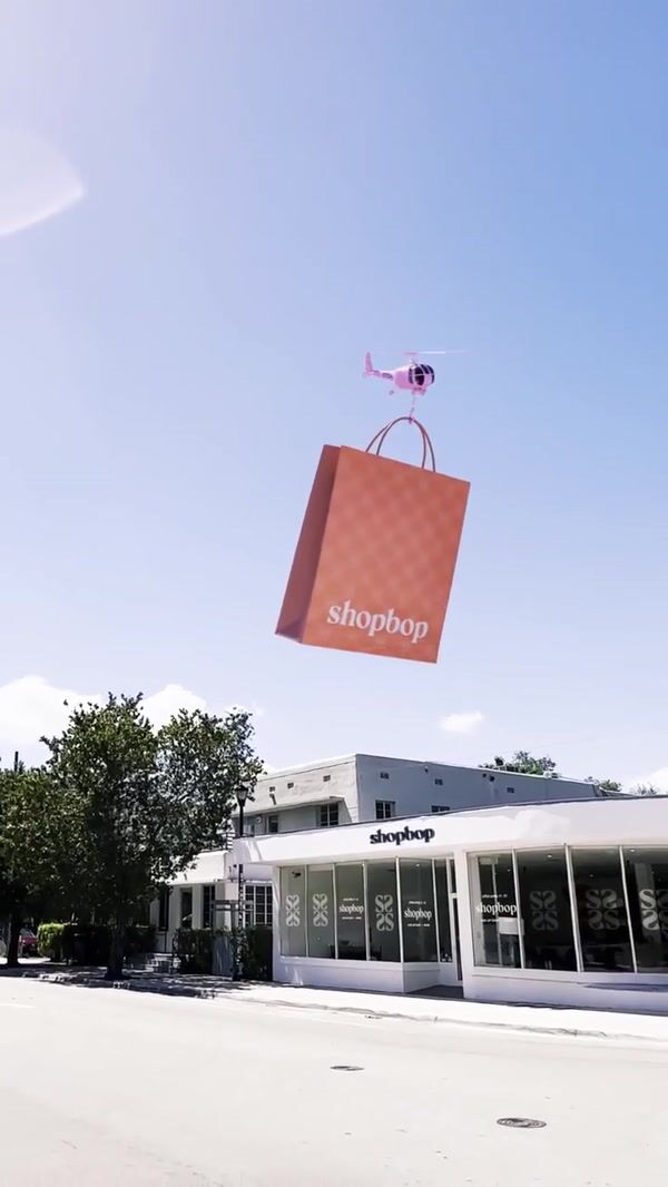 Shopbop Pink Helicopter Carries Shopping Bag