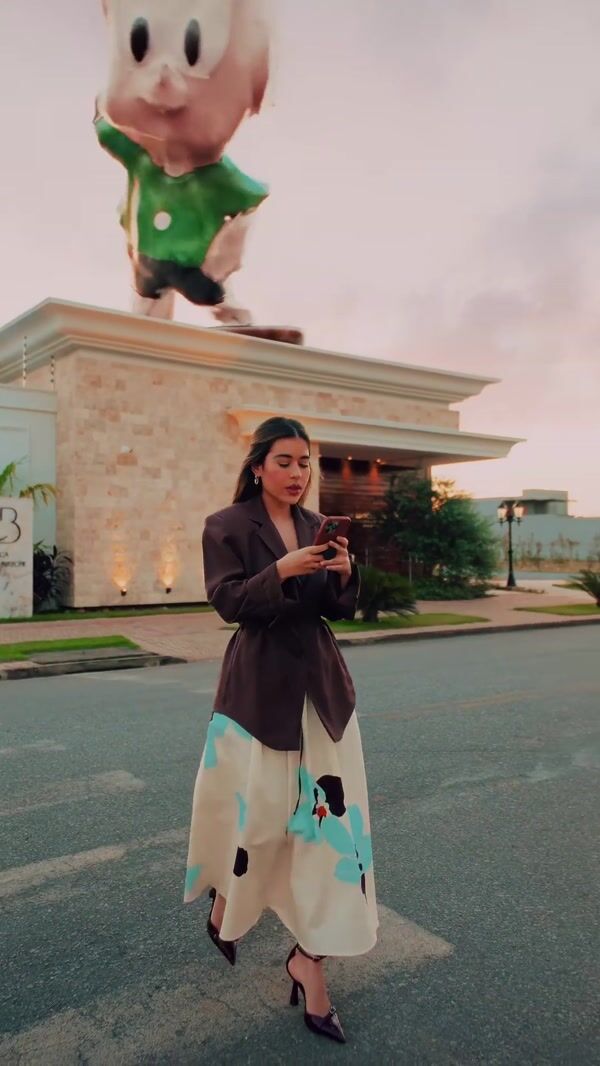 Marcella Birtche Hair Sprouts on Inflatable Mascot