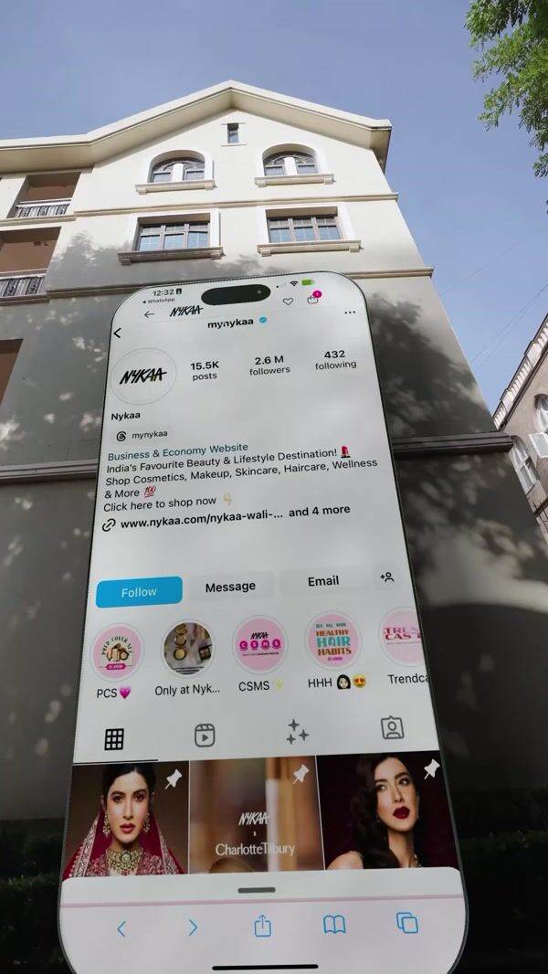 Nykaa Massive Smartphone Leaning on Building
