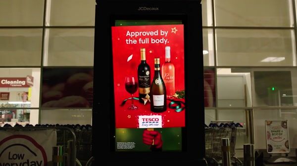 Tesco Holiday Signs Flip Across Display