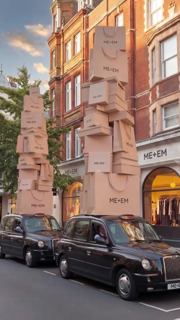 ME+EM Towering Stack of Shopping Bags on Car Roofs
