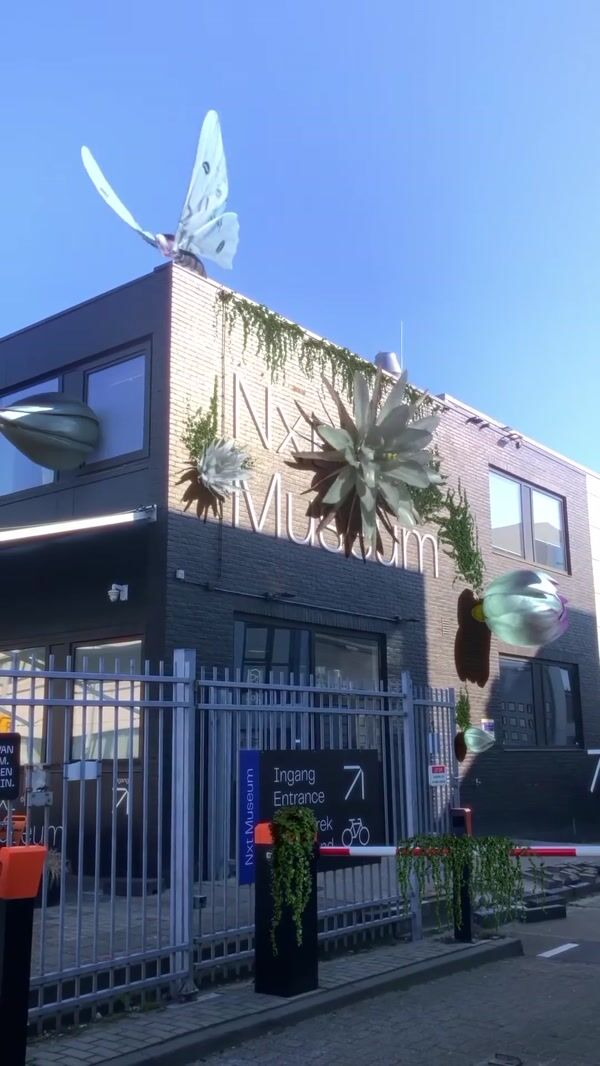 Nxt Museum Giant Flowers Bloom on Building Facade