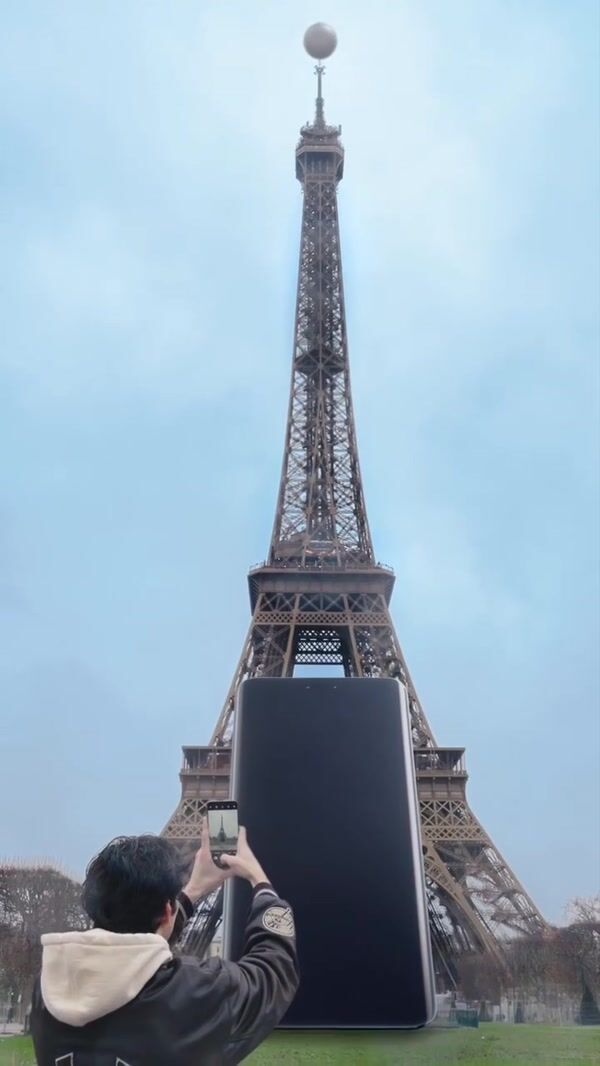 Honor Smartphone Leaning on Eiffel Tower
