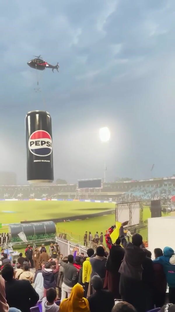 Pepsi Helicopter Delivers Soda Can to Stadium