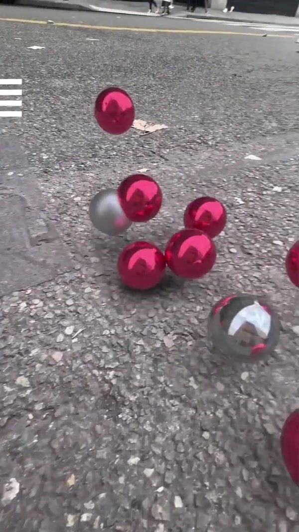 Sephora Christmas Balls Rolling Towards the Store