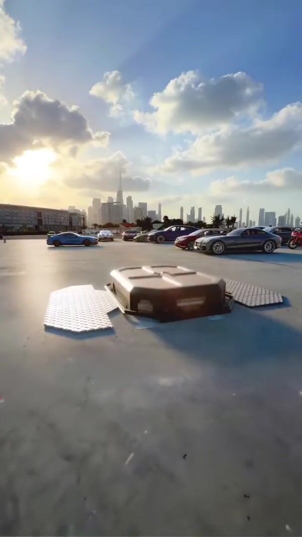 Samsung Robot Emerges from Metal Box