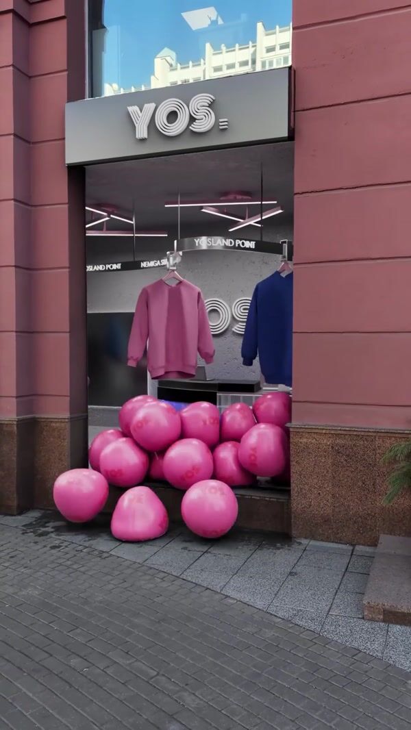 YOS Sweater Conveyor Display at Store