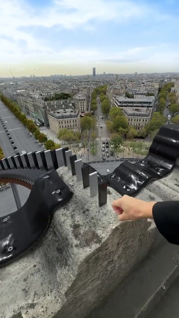 Sephora Dominoes Tumbles From Arc de Triomphe