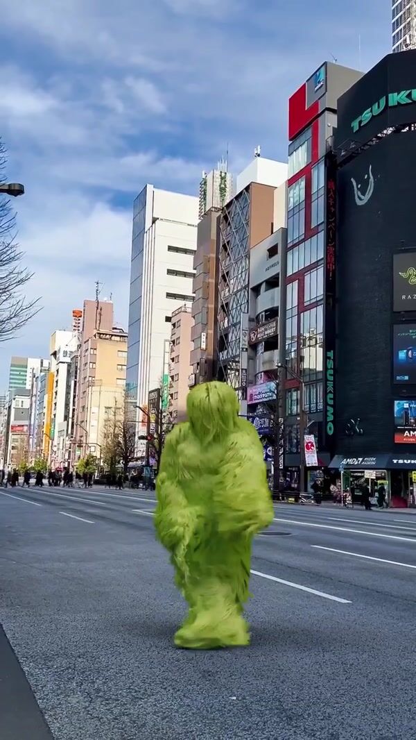ZARA Dancing Green Furry Mascot in Japan