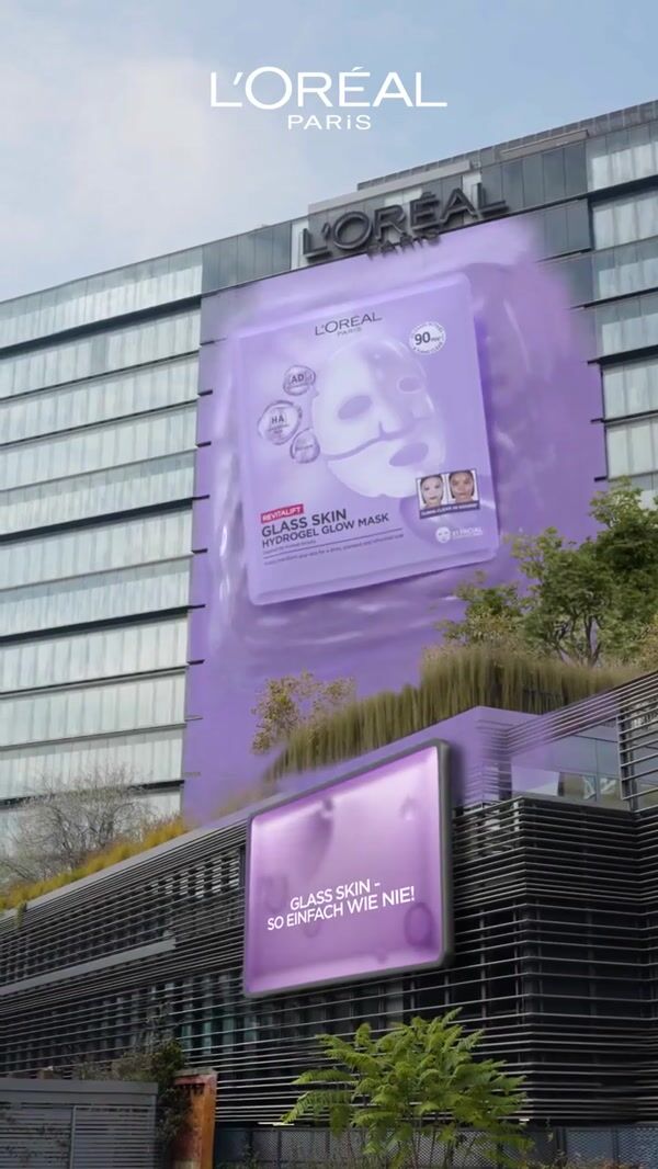 L'Oréal Paris Woman's Face Emerges from Facade