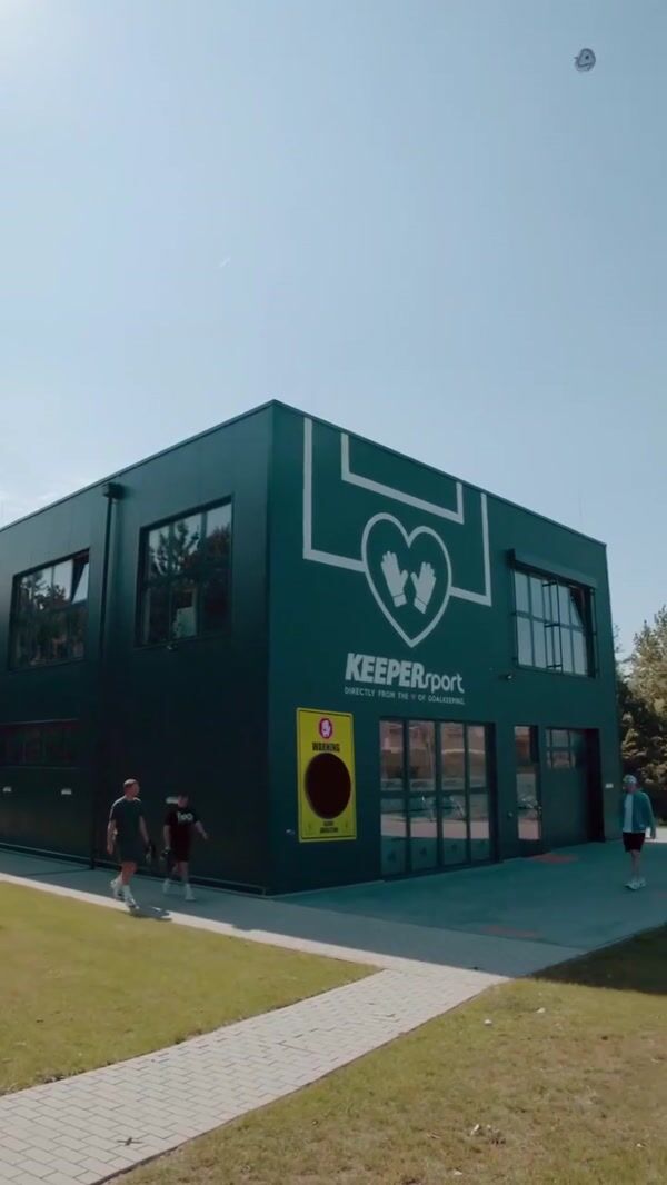 KEEPERsports Glove Catches Ball Above Store