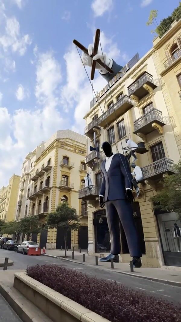 Pellini Collection Giant Marionette Wears Suit