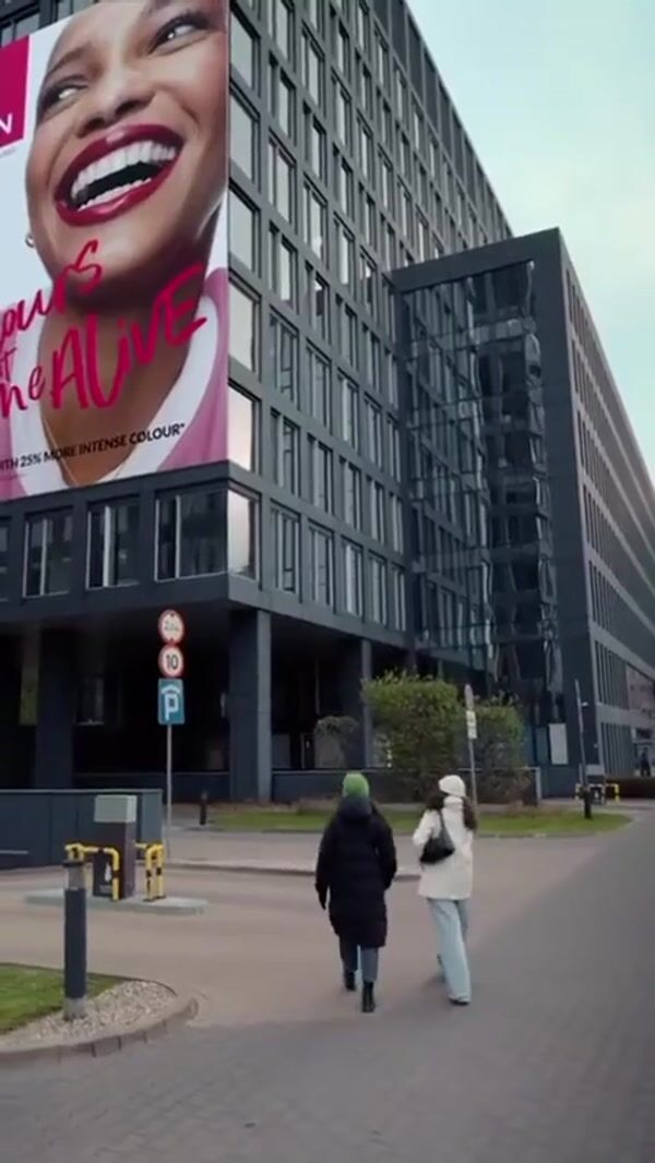 Avon Billboard Flips into Catalogue Pages