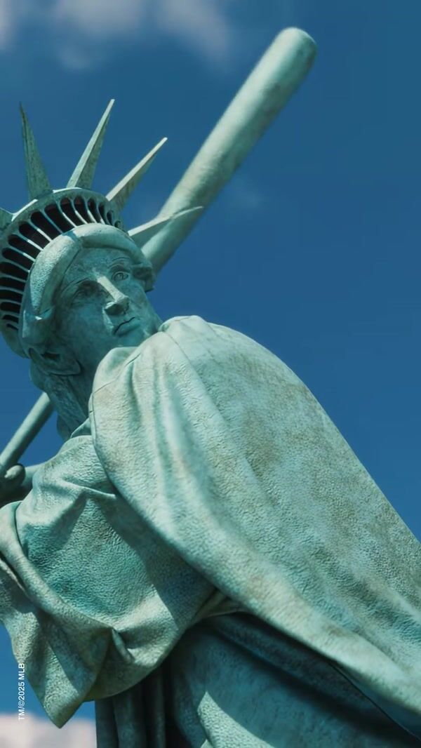 DKNY Statue of Liberty Hits a Baseball