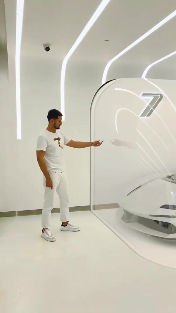 Seven Luxury Ferraris in Futuristic Showroom