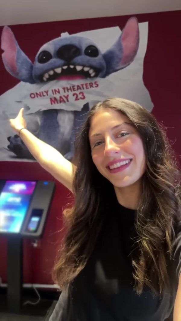 Disney Studios Stitch Grabs Phone from Woman