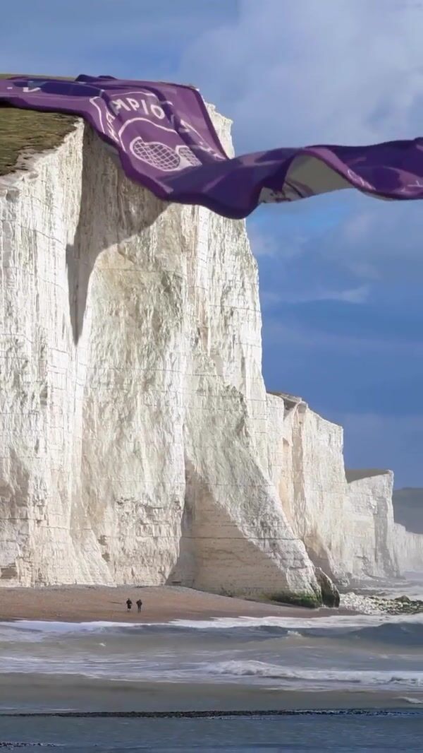 Christy Towel Hangs Like Curtain on Cliff