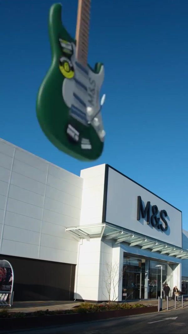 Marks & Spencer Green Guitar Landing at M&S Store