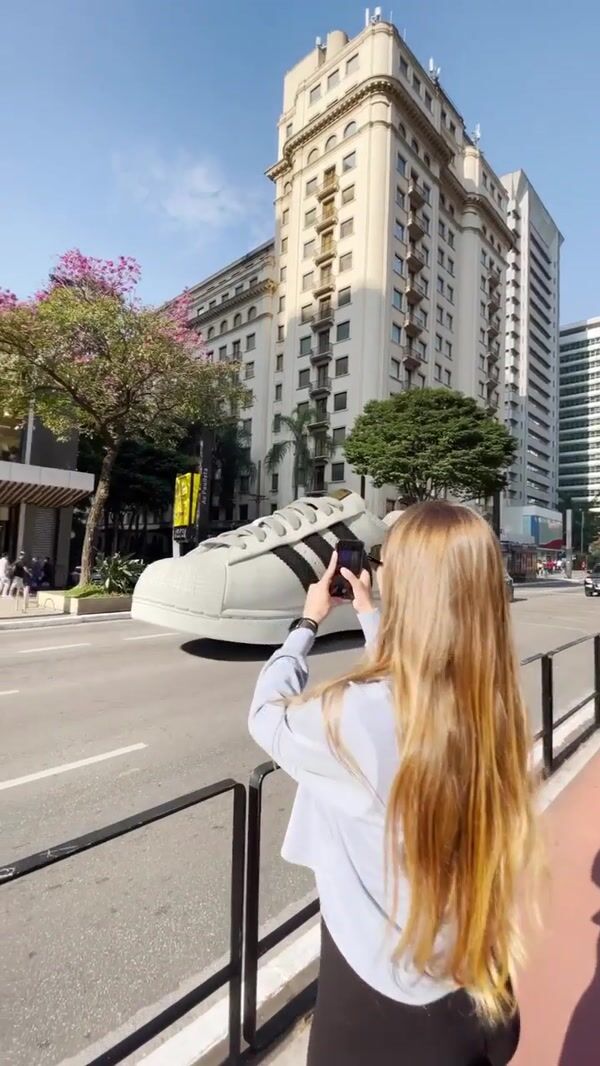 Adidas Shoes Driving Through Street