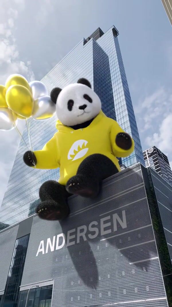 Andersen Panda Sitting on Rooftop