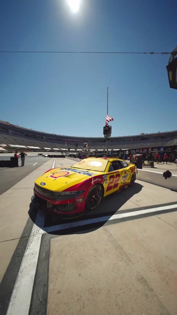 NASCAR Racing Cars Assemble on Track